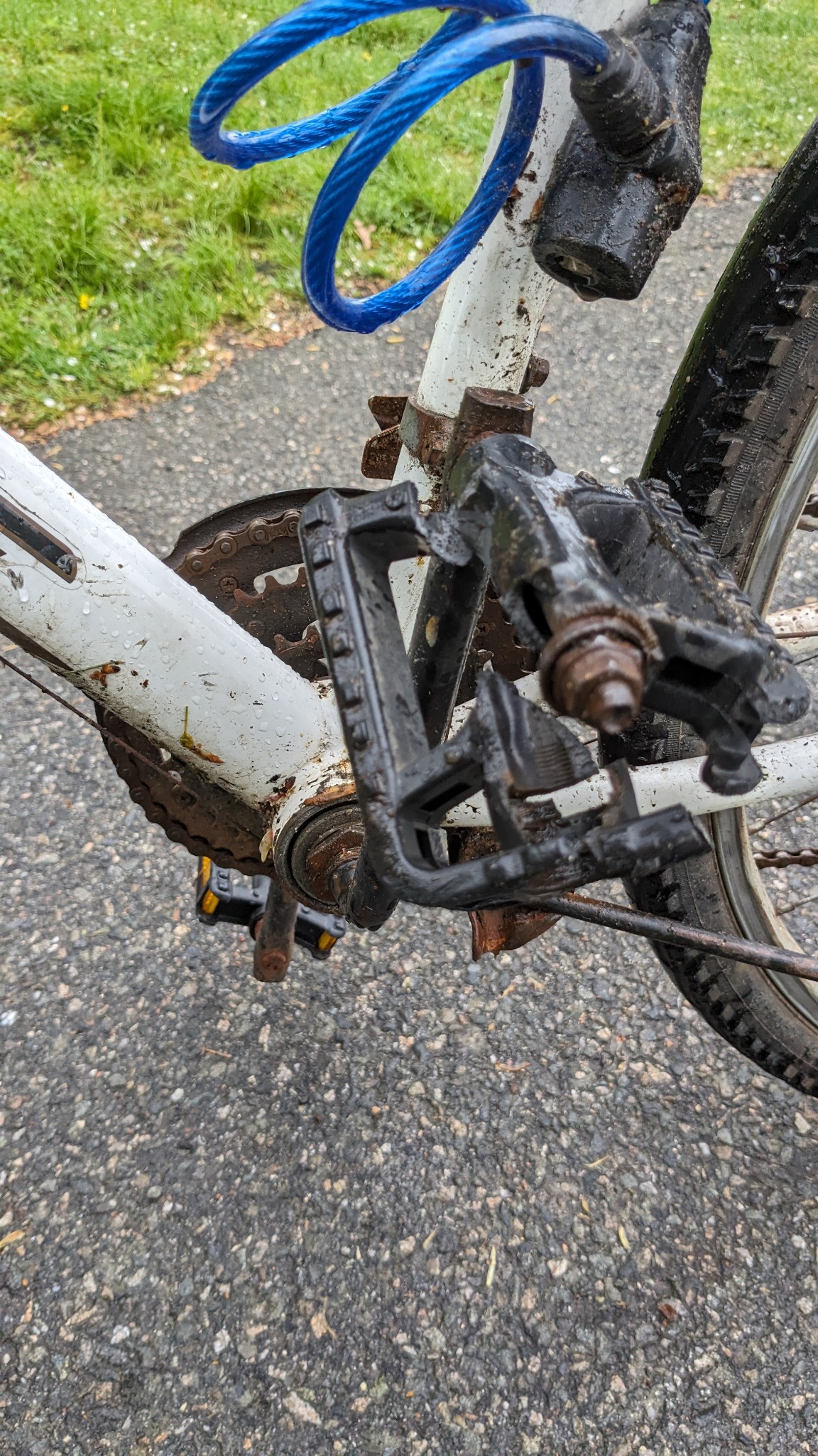 Broken bike on a rainy day